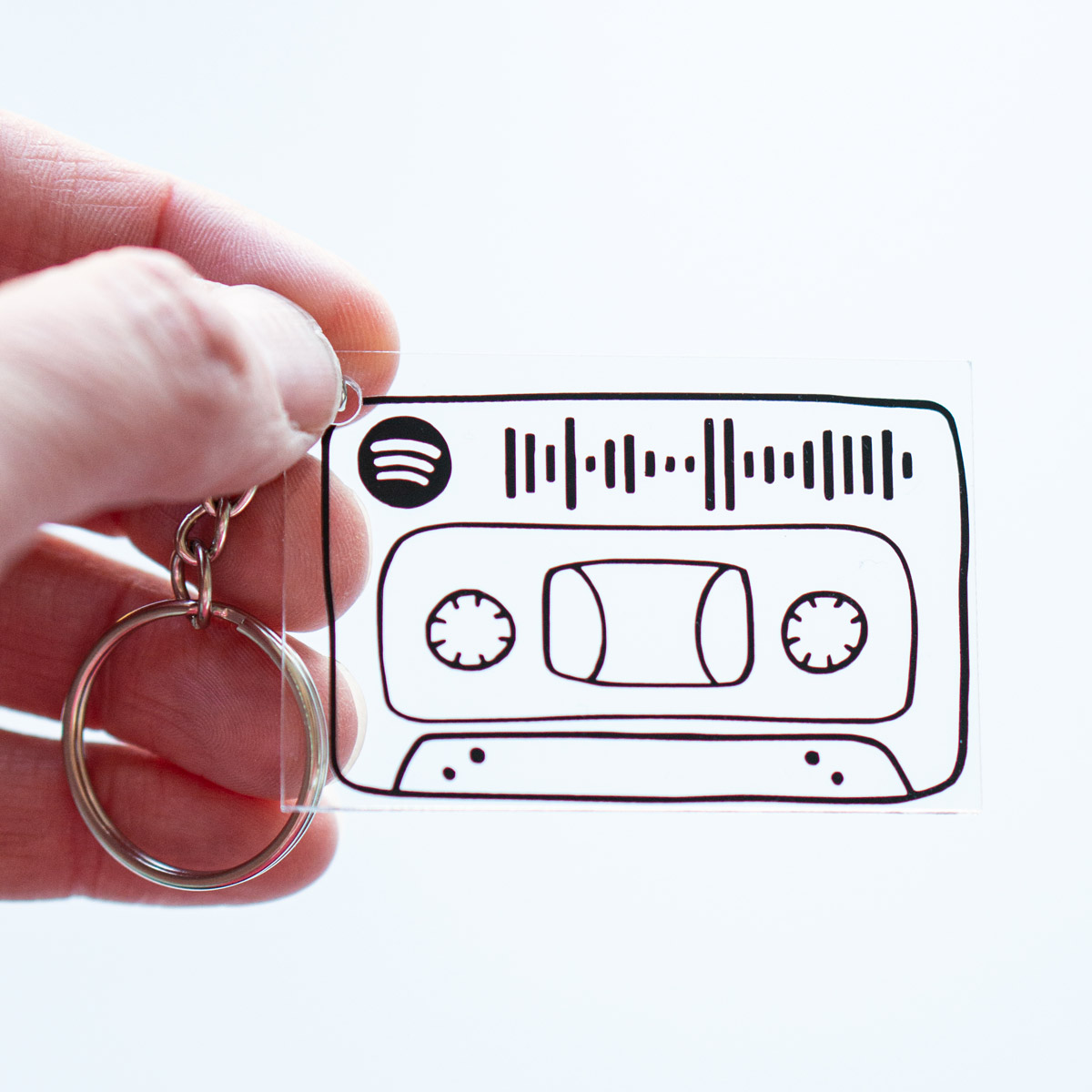 This image shows a song keychain DIY gift with a Spotify code.