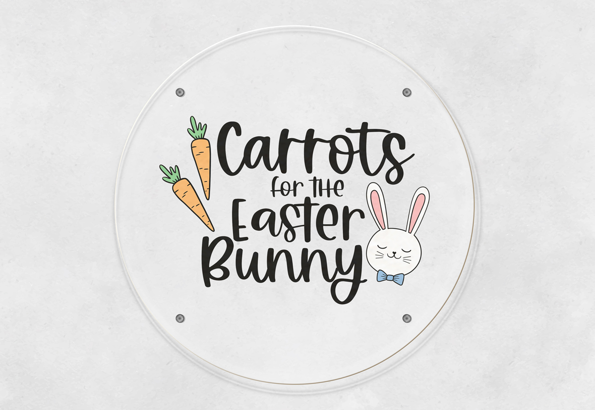 This image is of a round white plate with the words Carrots for the Easter bunny on it.