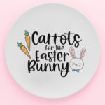 This image is of a round white plate with the words Carrots for the Easter bunny on it.