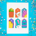 This image shows the 6 free cute printable Easter gift tags you can download at the end of this post. They are in bright, bold colors. There is a carrot, lamb, flower, chick, bunny, and Easter egg. The page of tags is surrounded by small flowers.