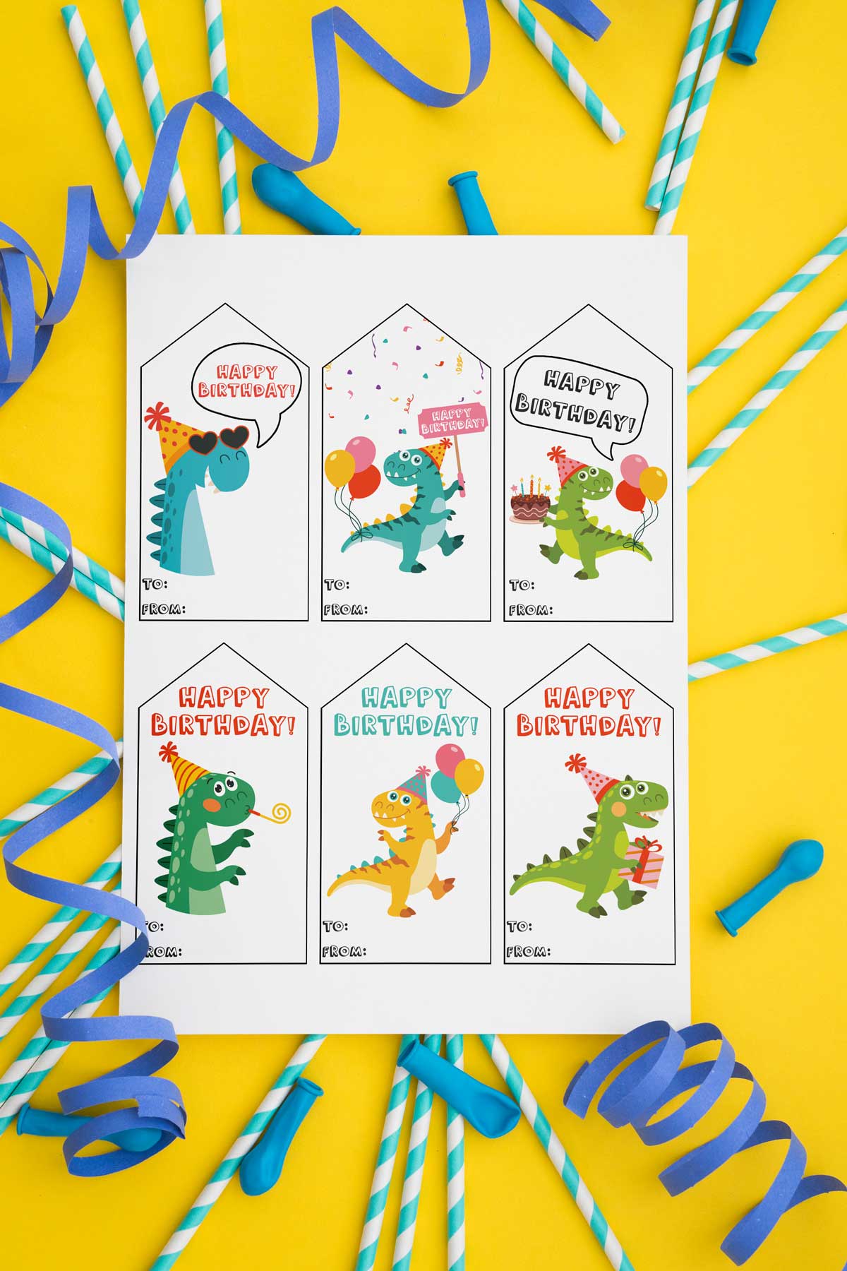 This image is showing one of the free printable birthday tags set - each tag has a different dinosaur and the words Happy Birthday.