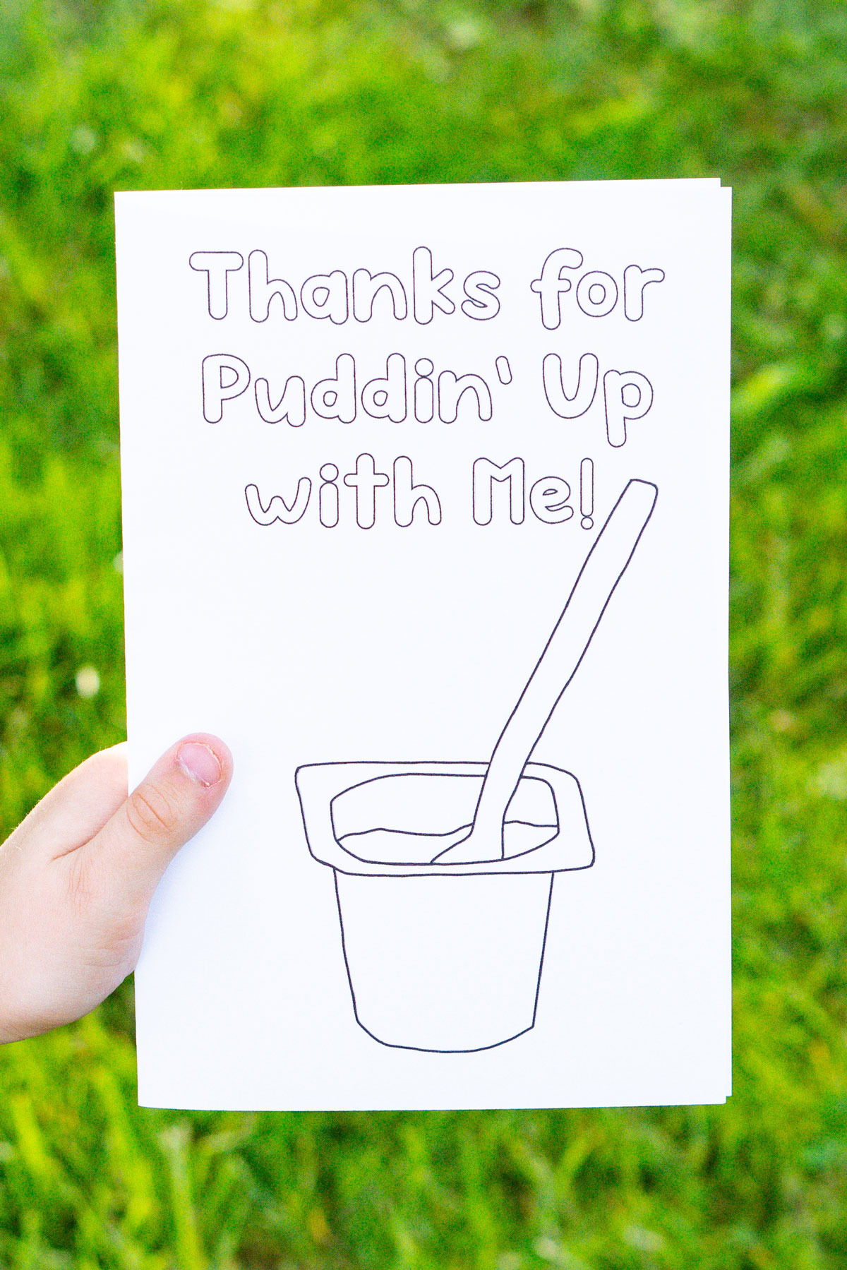 This is the picture of one of the free printable Mother's Day cards to color. This card says "Thanks for puddin' up with me!" and has a drawing of a pudding cup.