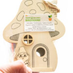 This image is showing one of the birthday party gift bag ideas which is a wooden birdhouse craft to paint.