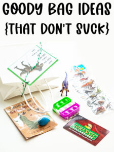 At the top it says goody bag ideas {that don't suck}. Below that, the image is showing one of the birthday party gift bag ideas which is themed for dinosaurs - dinosaur egg, dinosaur mini golf gift card, fidget, dinosaur toy, and dinosaur stickers.