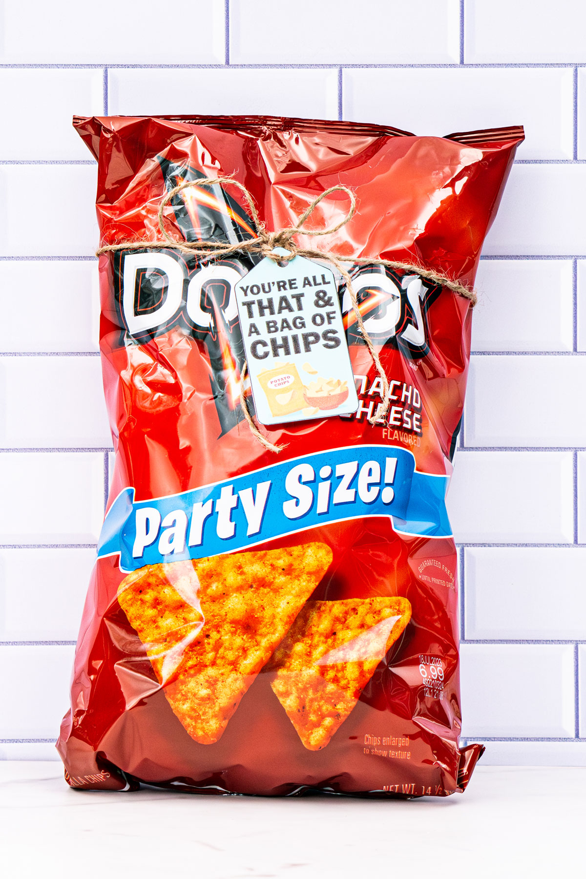 This is a bag of Doritos with a tag that says you're all that and a bag of chips.