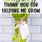 At the top, it says free gift tag. Thank you for helping me grow. Below that is an image of a mason jar of flowers (purple tulips) with a gift tag that says, "Thanks for helping me grow."