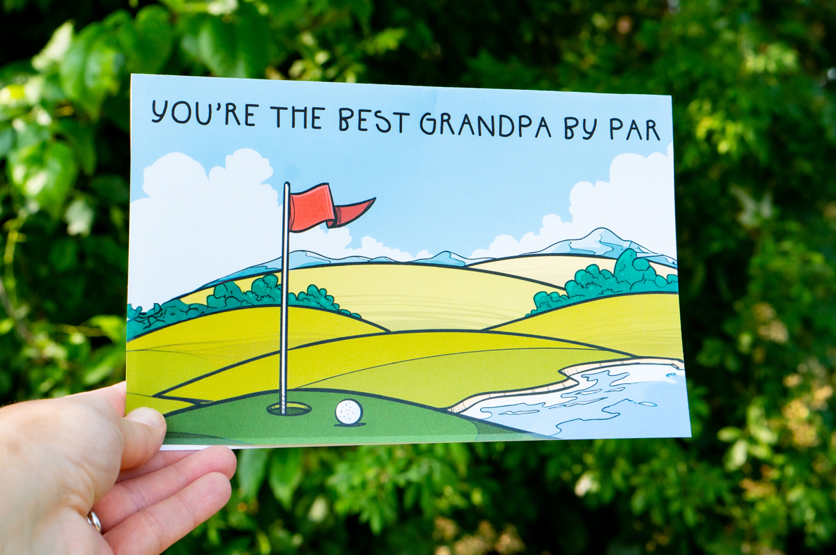 The card says "You're the best Grandpa by par." And it features a golf course.