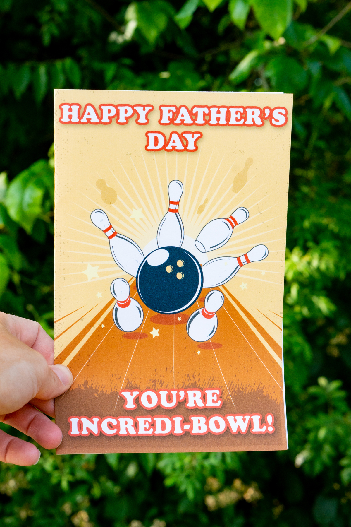 This card says "Happy Father's Day You're Incredi-bowl! It features a bowling ball knocking into pins.