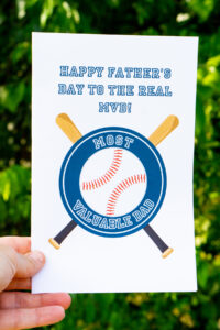 It says "Happy Father's Day to the Real MVD!" Then it has a baseball with two bats crossed behind it and a circle that says "Most Valuable Dad." This design also comes with a Grandpa option.