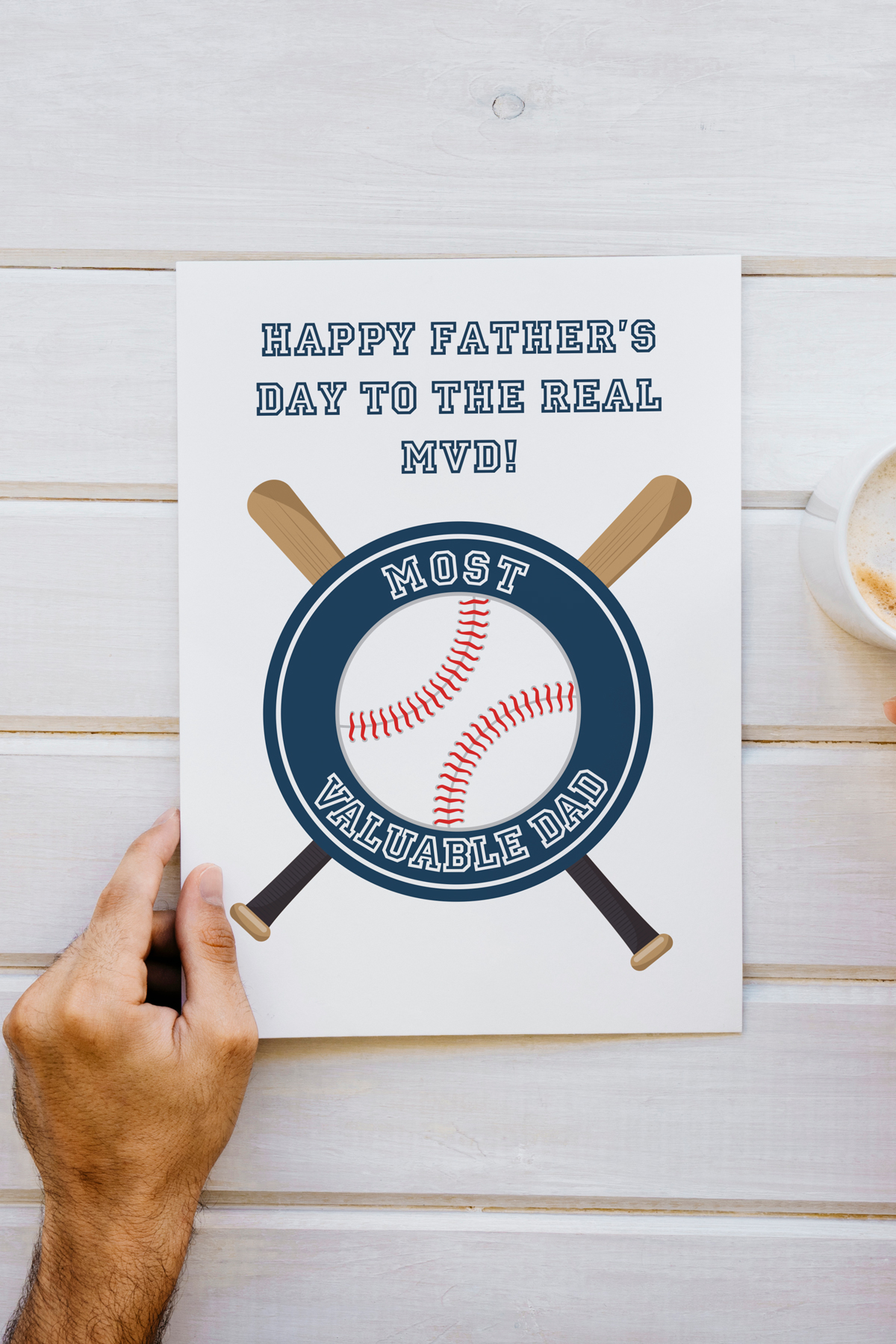 It says "Happy Father's Day to the Real MVD!" Then it has a baseball with two bats crossed behind it and a circle that says "Most Valuable Dad." This design also comes with a Grandpa option.