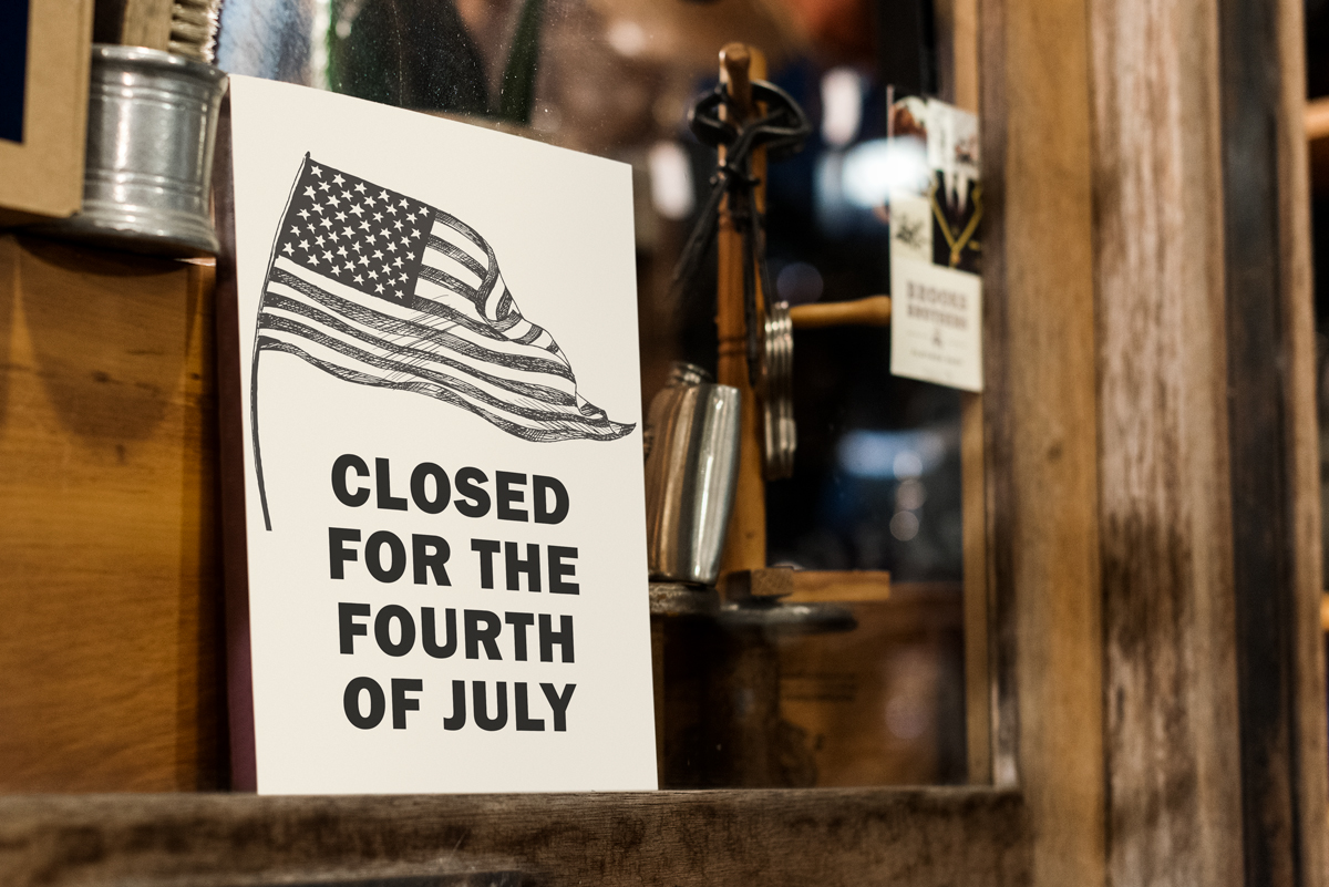 This shows a sign that says Closed for the Fourth of July. This is one of the printable Closed and Open for 4th of July templates you can download in this blog post.