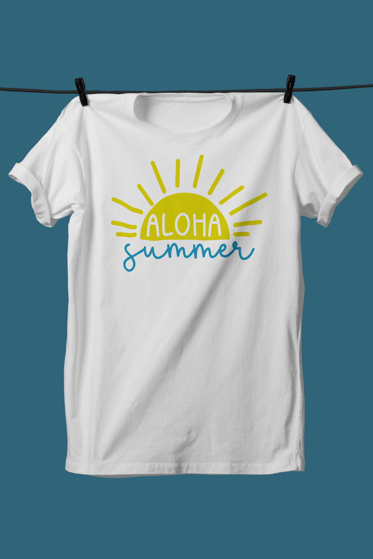 This image shows one of the SVGs from the free summer SVG set on a white tshirt. This one says aloha summer with the picture of a sun.