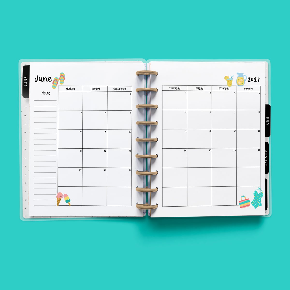 This image is an example of one of the printable 2027 calendar you can get for free at the end of this post. This is showing the month of June without holidays inside of an open planner.