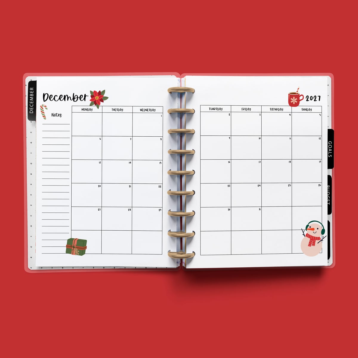 This image is an example of one of the printable 2027 calendar you can get for free at the end of this post. This is showing the month of December without holidays inside of an open planner.