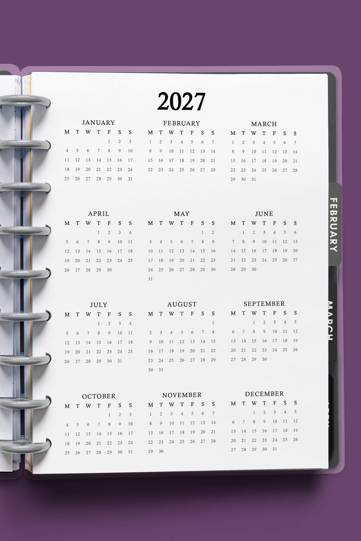 This image shows a 2027 free printable year at a glance calendar you can get for free in this blog post.