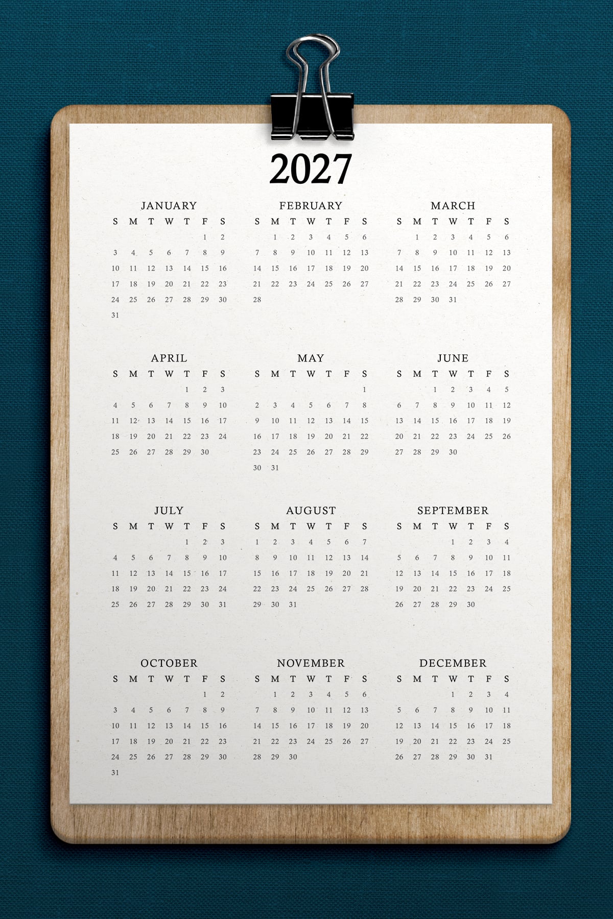 This image shows a 2027 free printable year at a glance calendar you can get for free in this blog post.