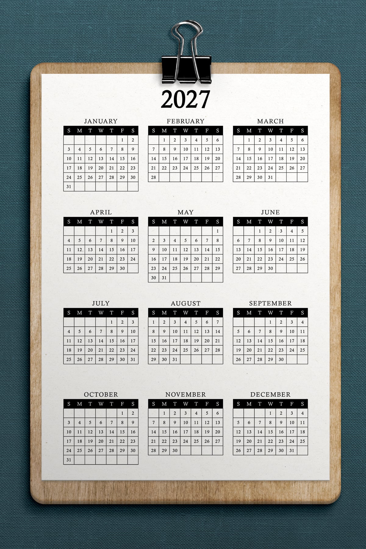 This image shows a 2027 free printable year at a glance calendar you can get for free in this blog post.