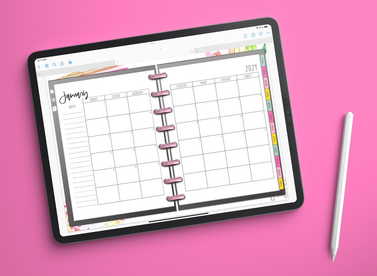 This image shows the free 2 page calendar template you can get at the end of this blog post. It's inside of an open planner to the month of January.