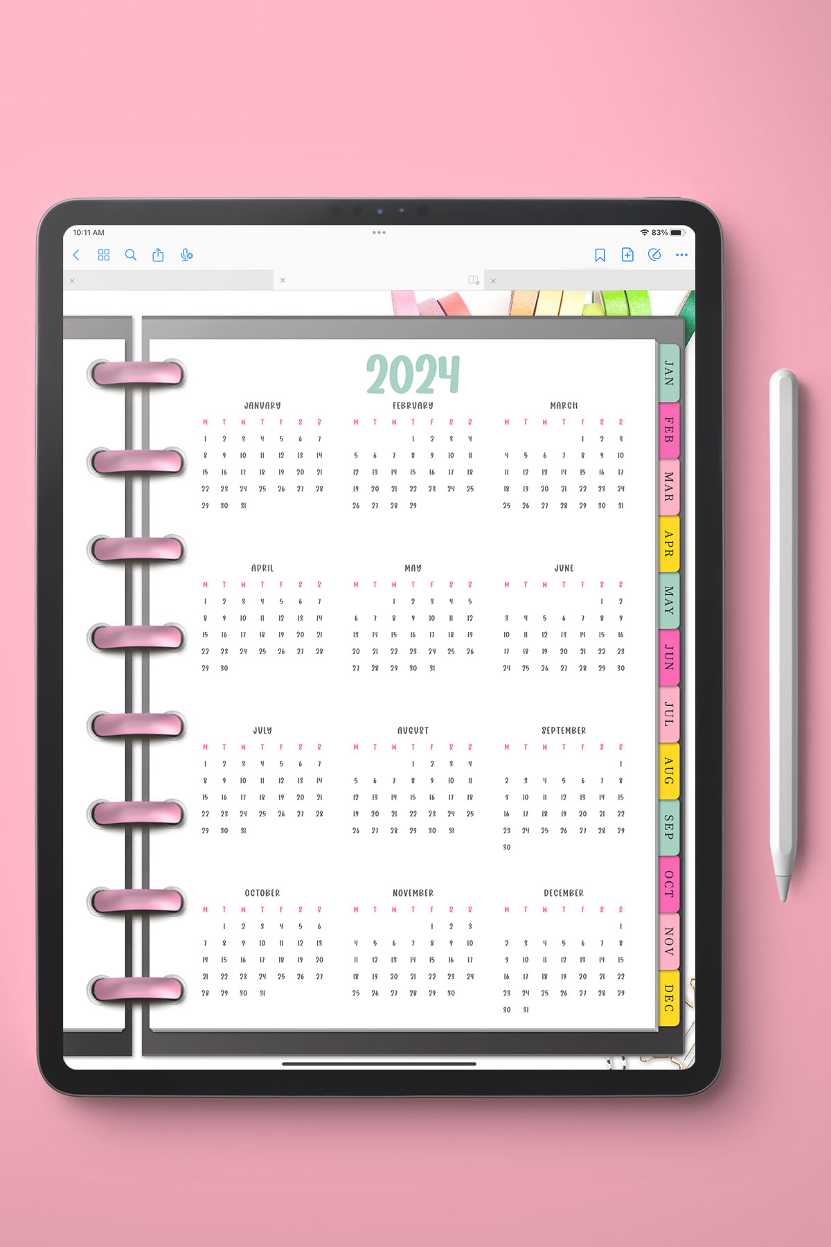 This image shows a 2024 free printable year at a glance calendar you can get for free in this blog post. It shows it in a digital planner instead of printed.