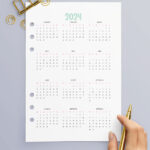 This image shows a 2024 free printable year at a glance calendar you can get for free in this blog post.