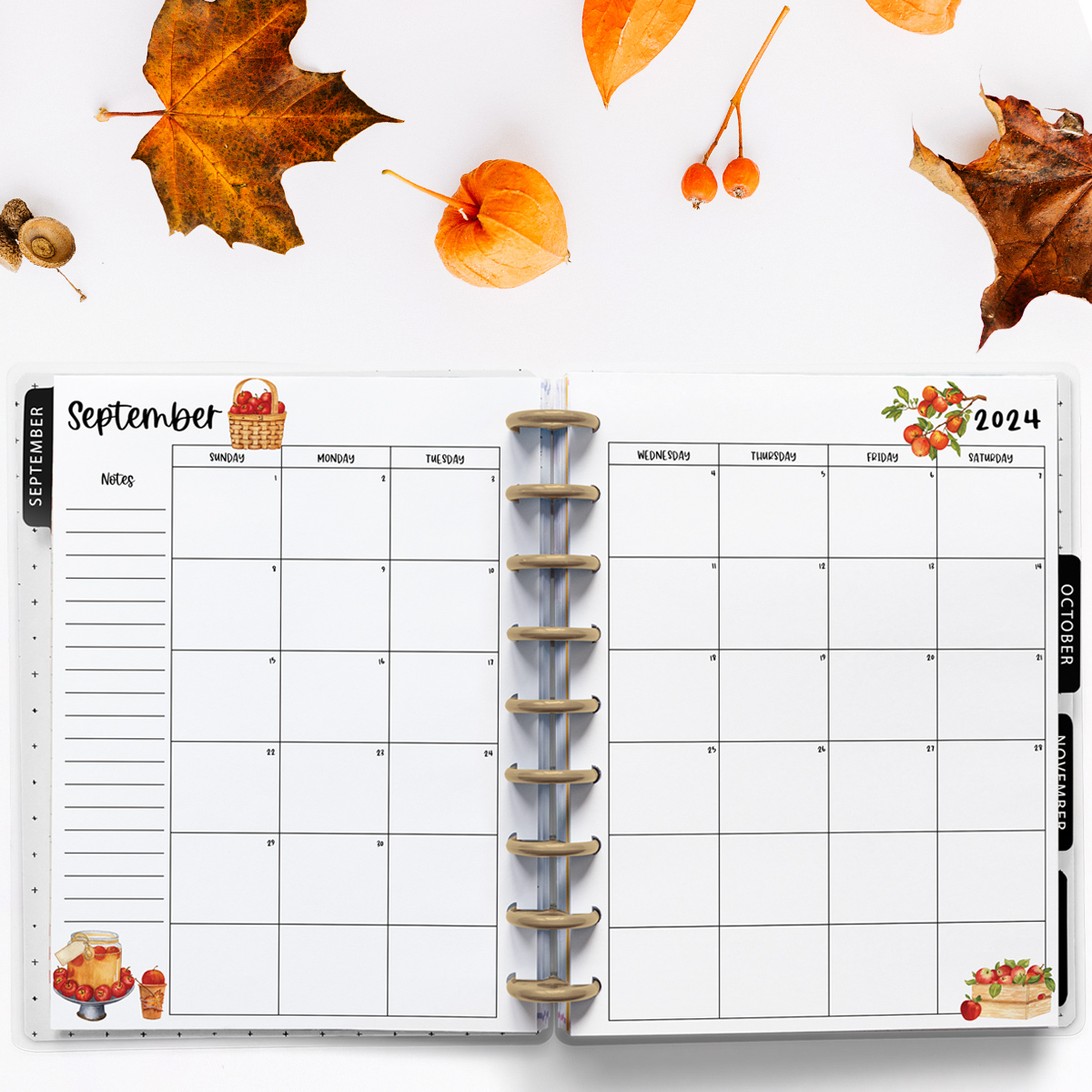 This image is an example of one of the printable 2024 calendar you can get for free at the end of this post. This is showing the month of September. Above the planner are some leaves and berries.