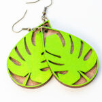 This is an image of a completed pair of tear drop wood earrings - tropical leaves - made with an xTools M1 laser machine. Learn how to make the wood earring in the post.