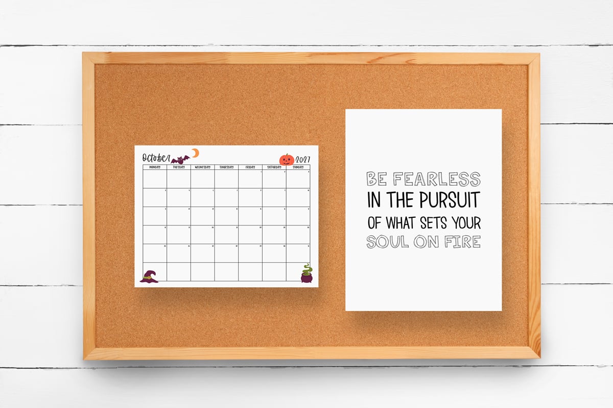 This image shows one of the months from this set of free printable calendars (starting with either a Sunday or Monday). This example is showing the month of October hanging on a bulletin board.
