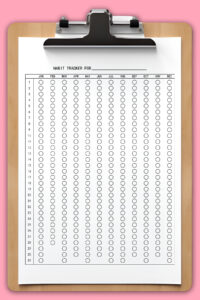 This is showing the picture of a yearly habit tracker that you can get for free at the end of this post,