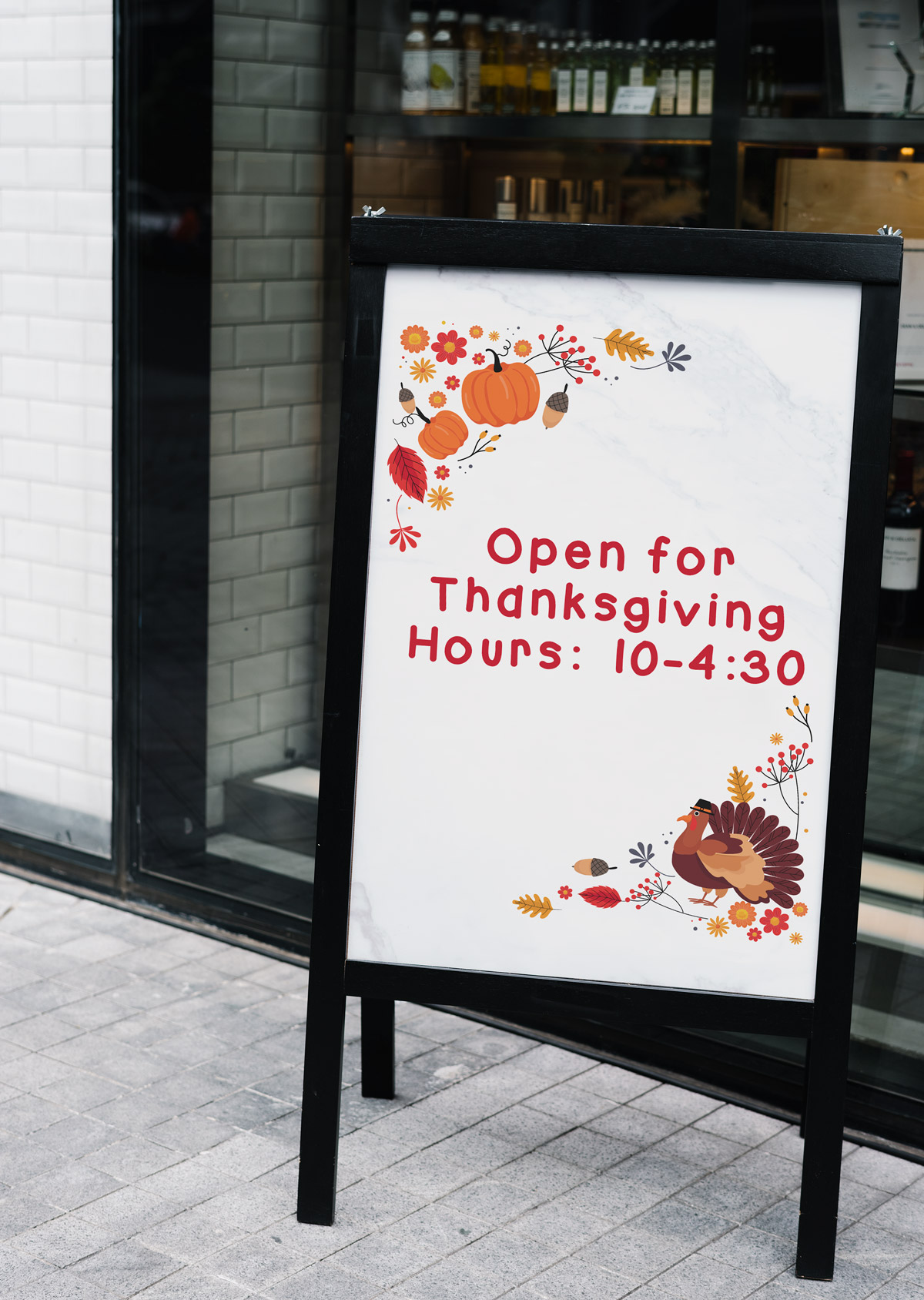 This image shows one of the free printable Open for Thanksgiving Signs you can get in this post. It says Open for Thanksgiving and then "Hours: 10-4:30" below that.