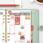 At the top it says free digital & printable Christmas planner stickers. Below is an image of the one sheet of the free printable Christmas planner stickers you can get for free at the end of this post. They are inside of a green planner.