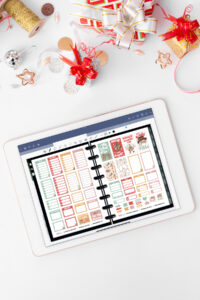 This is an iPad open to a planner of the free digital Christmas planer stickers you can get at the end of this blog post.