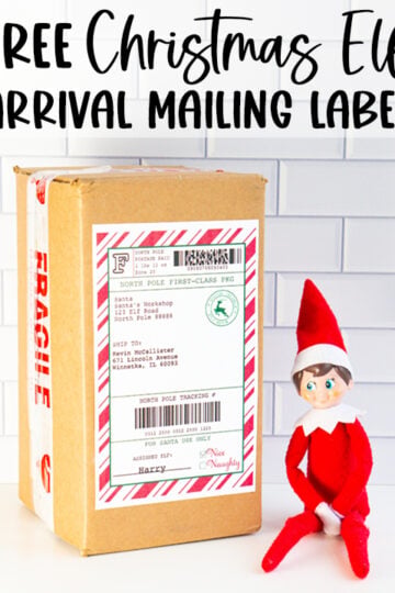 At the top it says free Christmas elf arrival mailing label. Below that is an image showing an example of the elf on the shelf sitting next to a package with the free elf on the shelf mailing label on it.