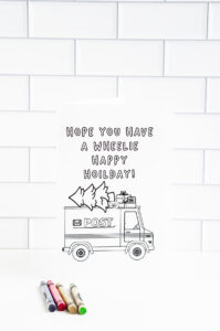 This is one of the 25 free printable Christmas cards to color you can get for free in this blog post. This one says we hope you have a wheelie happy holidays.