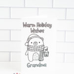 This is one of the 25 free printable Christmas cards to color you can get for free in this blog post. This one says warm holiday wishes grandma.