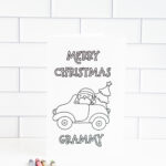 This is one of the 25 free printable Christmas cards to color you can get for free in this blog post. This one says Merry Christmas Grammy.