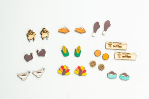 This image shows the Thanksgiving earrings after they've been painted. They were made with the free Thanksgiving earrings svgs.