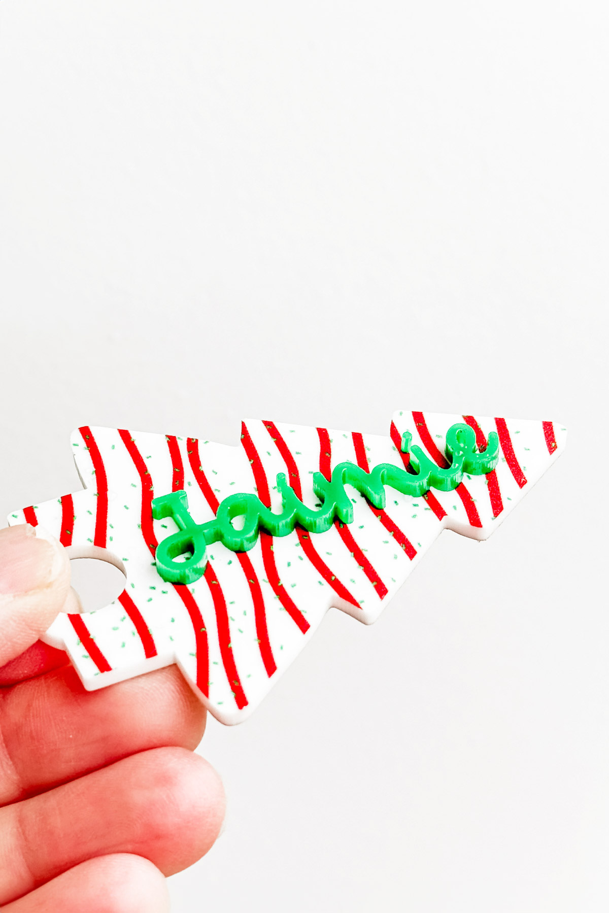 This is an image of the free Stanley Christmas tree cake topper you can get in this post.