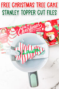 At the top it says free Christmas tree cake Stanley topper cut files. Below that is an image of the free Stanley Christmas tree cake topper you can get in this post.