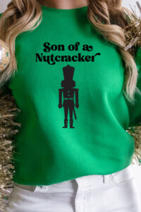 This is one of the free funny Christmas shirts you can make with the free SVGs from the post. This one says Son of a Nutcracker with the picture of a nutcracker.