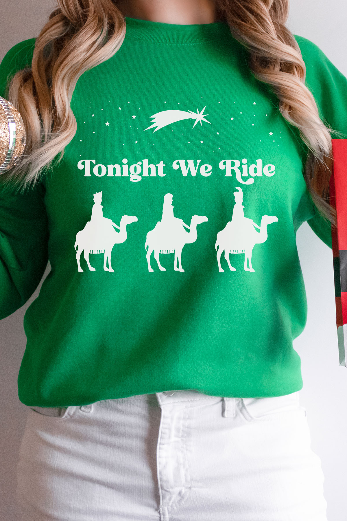 This is one of the free funny Christmas shirts you can make with the free SVGs from the post. This one says Tonight We Ride with the picture of 3 wisemen.