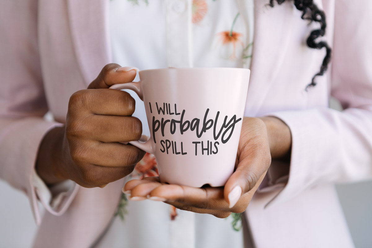 This is an example of one of the free coffee mug quote svgs you can get for free in this post. It says I'll probably spill this.