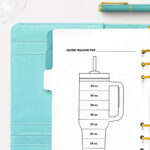 This image is an example of one of the water tracker printable options from the free printable water tracker set you can get for free in this blog post. It's next to two bottles of water.