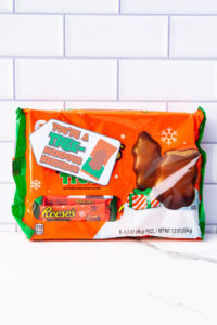 This is one of the free Christmas treat gift tags you can download in this post. It says, You're a Tremendous Teacher. This version of the tag features the Reese's Peanut Butter Tree. The tag is attached to a pack of Reese's Peanut Butter trees.