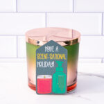 This is one of the free Christmas treat gift tags you can download in this post. It says, Have a Scent-Sational Holiday. It features a candle and a soap pump dispenser. The tag is attached to a candle.
