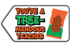 This is one of the free Christmas treat gift tags you can download in this post. It says, You’re a Tremendous Teacher. This version of the tag features the Reese’s Peanut Butter Tree.