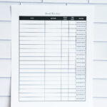 Minimalist reading challenge printable featuring 12 outlined book icons labeled January through December with a notes section at the bottom, displayed against a white tile background.