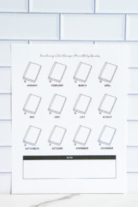 Collage of multiple reading challenge printables including book-tracking pages, alphabet challenges, monthly trackers, and numbered book icons.