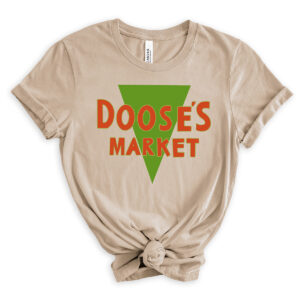 Beige T-shirt with the bold green and orange &ldquo;Doose&rsquo;s Market&rdquo; logo centered on the front.