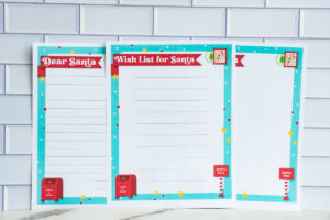 Assortment of Santa-themed printable stationery pages including Dear Santa letters and Wish List for Santa sheets displayed together.