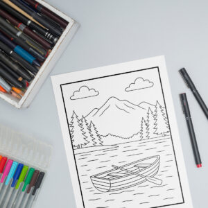 Relaxation coloring page featuring a mountain lake with pine trees and a rowboat, surrounded by colored pencils and markers on a tabletop.